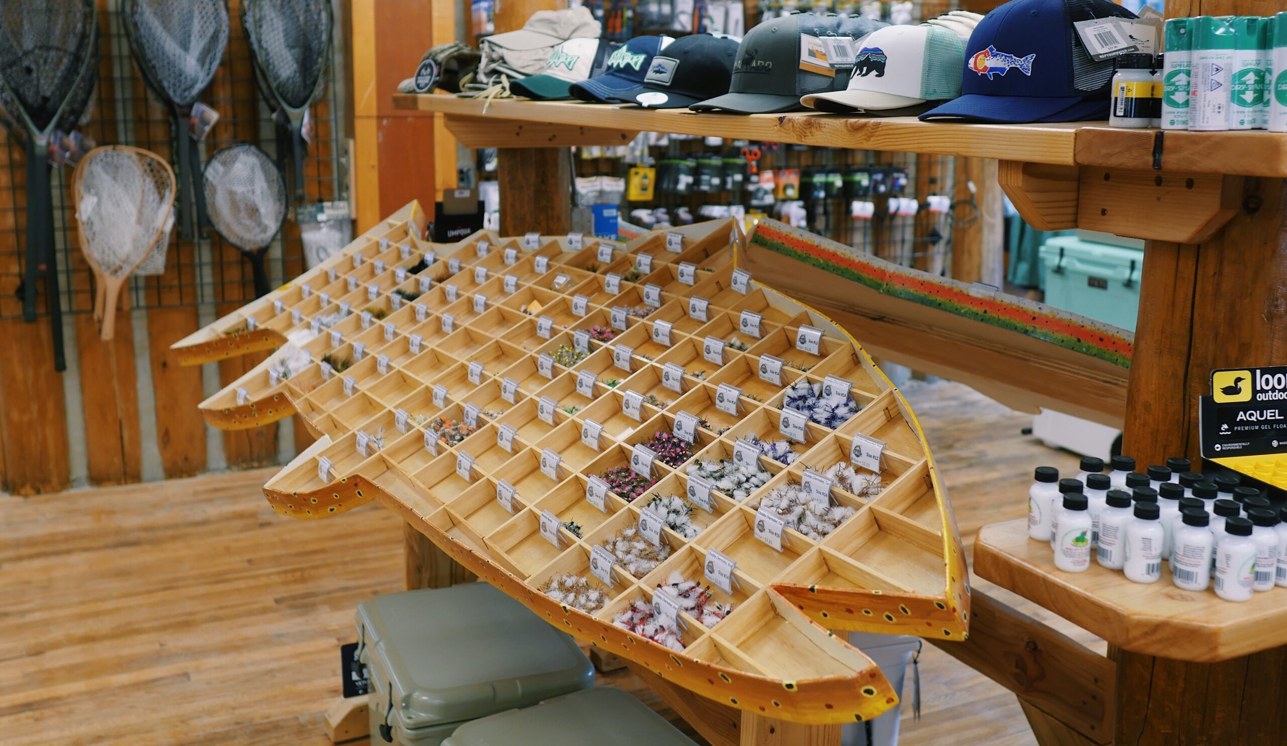 Grand Lake Fly Shop Wooden bin holds flies for fly fishing